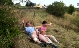 Busty Brunette Fingers Her Pussy And Blows A Cock Outside