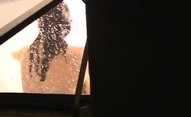 Voyeur Spying On A Busty Amateur Brunette Taking A Shower