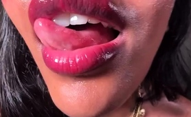 Indian vixen showing off soft wet lips and probing tongue